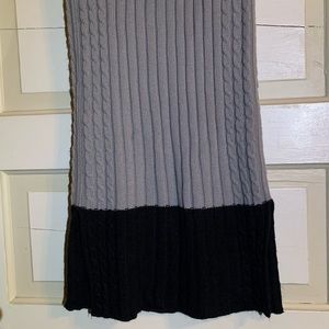 Super cute winter skirt. Ribbed sweater material. Form fitting. Small.